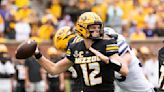 Missouri quarterback Brady Cook endures the home boos and keeps the Tigers on an unbeaten roll