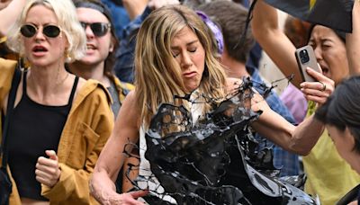 Jennifer Aniston fuming as she's splashed with liquid while filming tv show