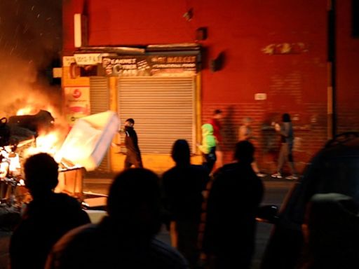 Police cars flipped, bus on fire: What's behind the riots in UK's Leeds?