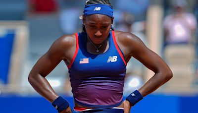 U.S. flag bearer tennis star Coco Gauff out of Olympics singles as disputed call leaves her in tears