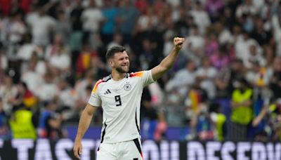 Euro 2024: Last-gasp Niclas Fuellkrug goal rescues top spot for hosts Germany against Switzerland