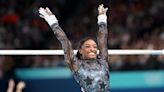 Simone Biles shows her grit, overcoming leg injury in impressive Paris start