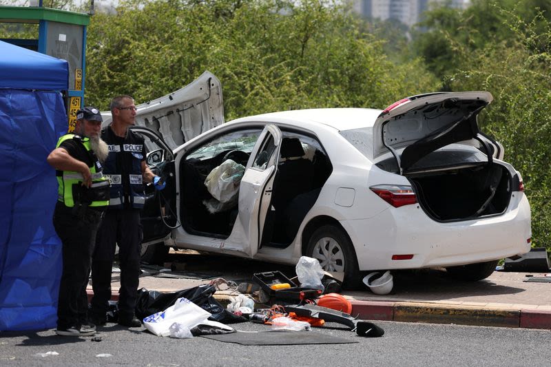 Four people wounded in car ramming attack in central Israel