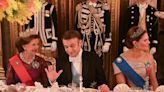 Macron feasts with Swedish royalty as French farmers camp on motorway