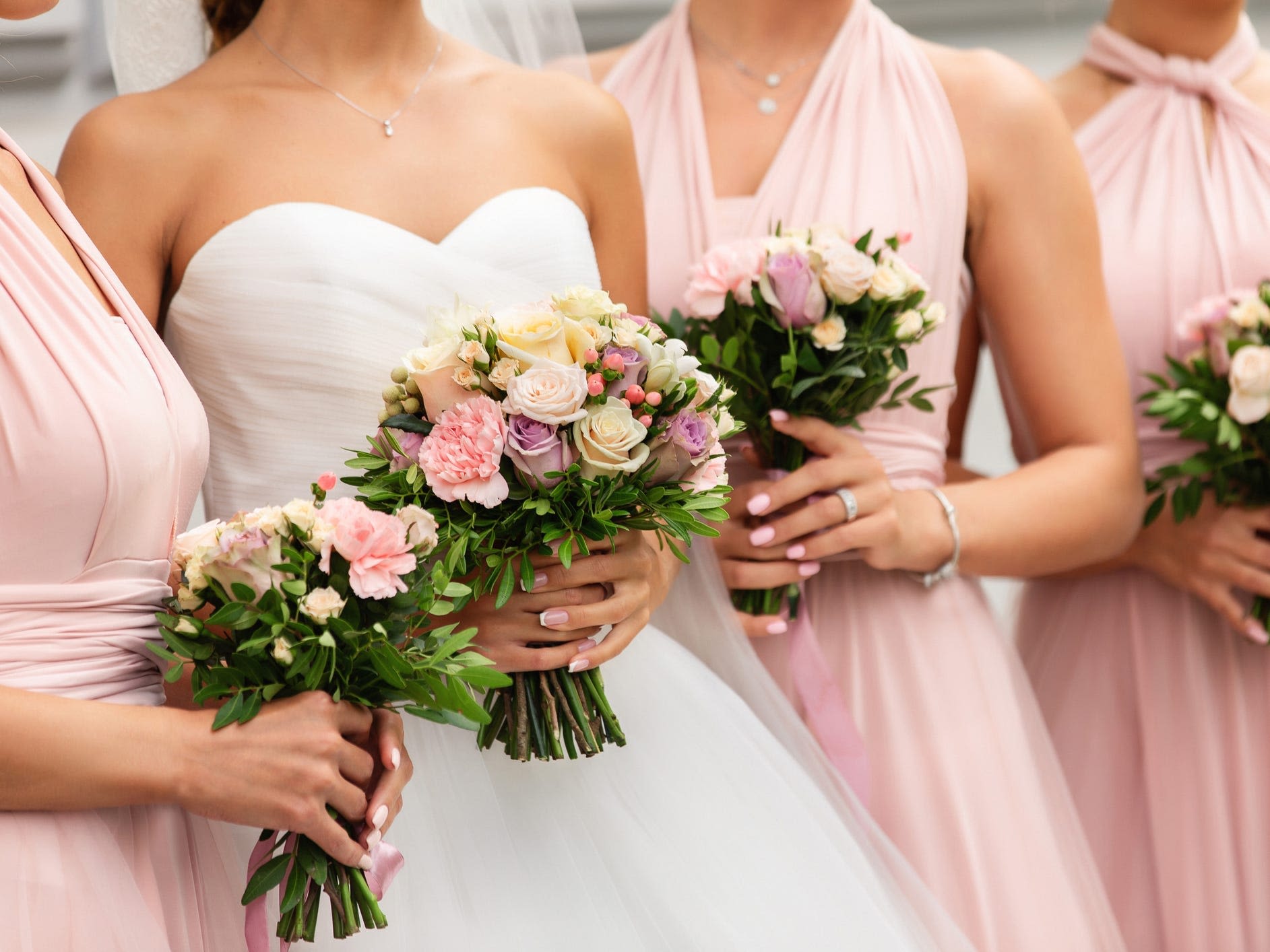 My family covered the bridesmaids' expenses at my daughters' weddings because it didn't seem right to ask the women to pay