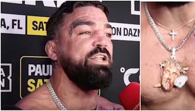 This is what Mike Perry is wearing around his neck ahead of the Jake Paul fight in boxing