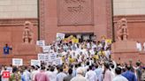 Stop ' misusing' agencies to silence opposition: INDIA bloc MPs stage protest against govt - The Economic Times