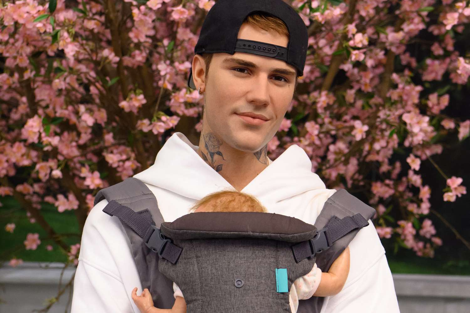 Justin Bieber wax figure at Madame Tussauds now has a baby on board