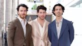 Jonas Brothers announce new album release date and future tour during their Hollywood Walk of Fame ceremony