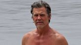 Josh Brolin gets dripping wet as he shows off muscled torso on beach