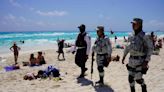 8 bodies found in wooded lots, sinkhole ponds in Mexican resort area of Cancun