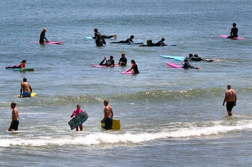 Shark season has begun on the Cape. Why aren’t swimmers concerned? - The Boston Globe