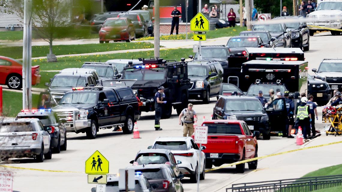 Police shot and killed armed student outside Wisconsin school, authorities say