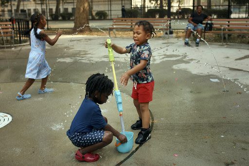 Scorched by history: Discriminatory past shapes heat waves in minority and low-income neighborhoods