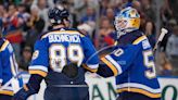 Blues hold off Flames, 5-3 stay in playoff chase