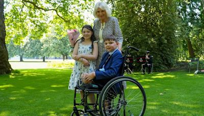 Tony and Lyla meet Queen Camilla at Buckingham Palace after missing royal party