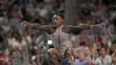 Simone Biles cruises to 9th national title and gives Olympic champ Sunisa Lee a boost along the way