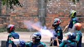 Bangladesh protesters set state TV HQ ablaze as toll mounts, internet cut