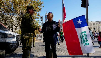 Assailants ambush and kill 3 police officers in southern Chile, shaking the country