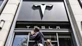 Tesla Plans More Job Cuts as Two Senior Executives Leave, Report Says
