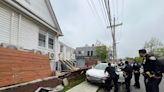 Cars careen into fence, store on Staten Island; 2 people taken to hospital