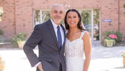 Hero dad walks through 30 miles of flood debris to daughter's wedding