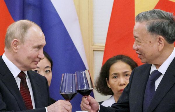 Putin signs deals with Vietnam in bid to shore up ties in Asia to offset Moscow’s growing isolation