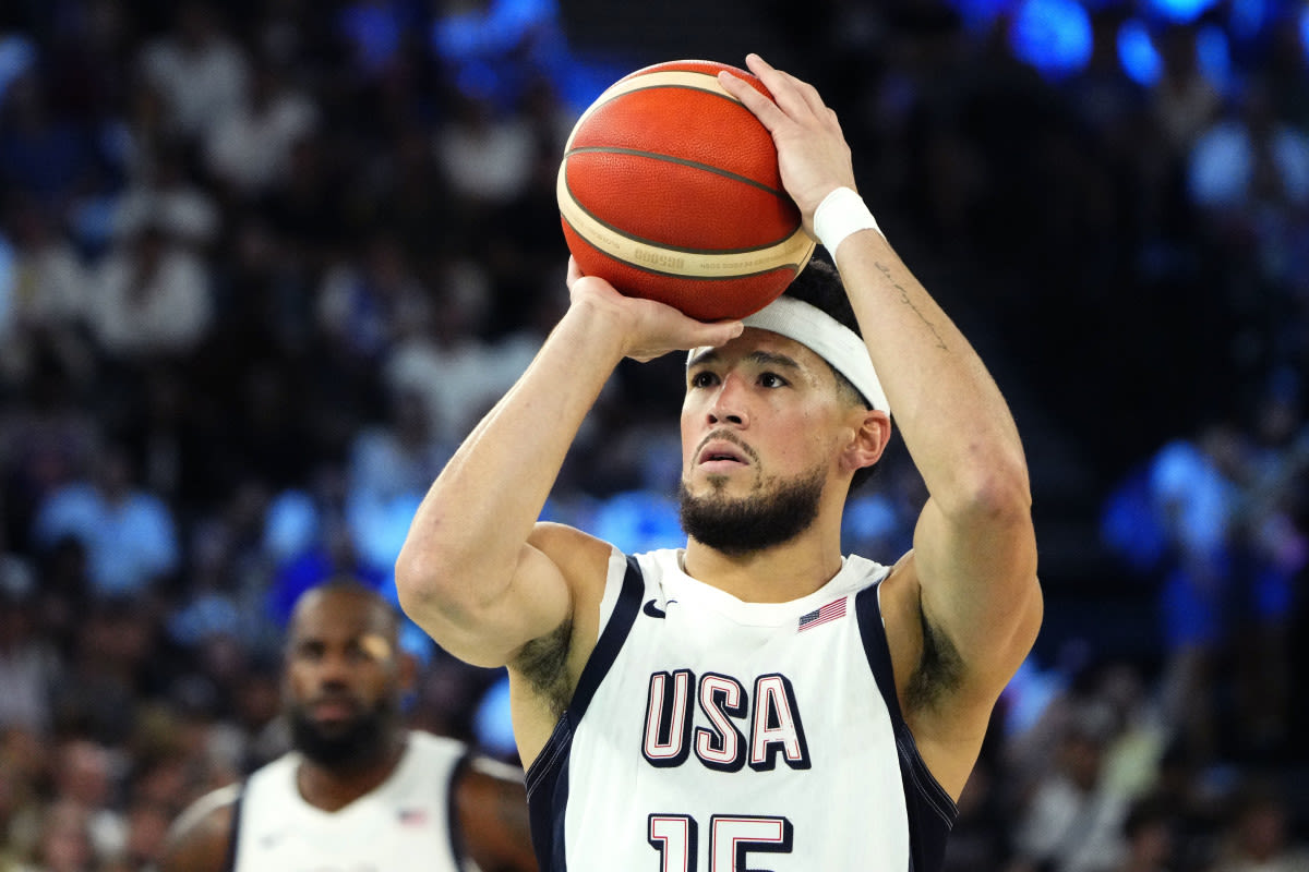 Devin Booker Earns Legend Status With Epic Gold Medal Party Exit