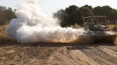 Israel says jets strike school containing Hamas compound, Gaza media says 27 killed