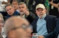 Brazilian President Luiz Inacio Lula da Silva (in hat) promised 'there will be no lack of human or material resources' to deal with the emergency