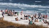 SWFD lifeguard rescues man, dog that swam too far from shore in Miramar Beach