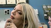 Tori Spelling shows off her new body piercings she got on Mother's Day