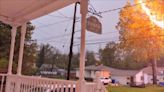 Moment lightning bolt strikes house sparking fire in West Seneca, New York