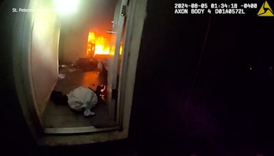 Dramatic video shows officers rescue man from burning house in St. Petersburg