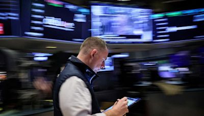 Wall St ends higher as investors firm bets on Trump win, rate cuts