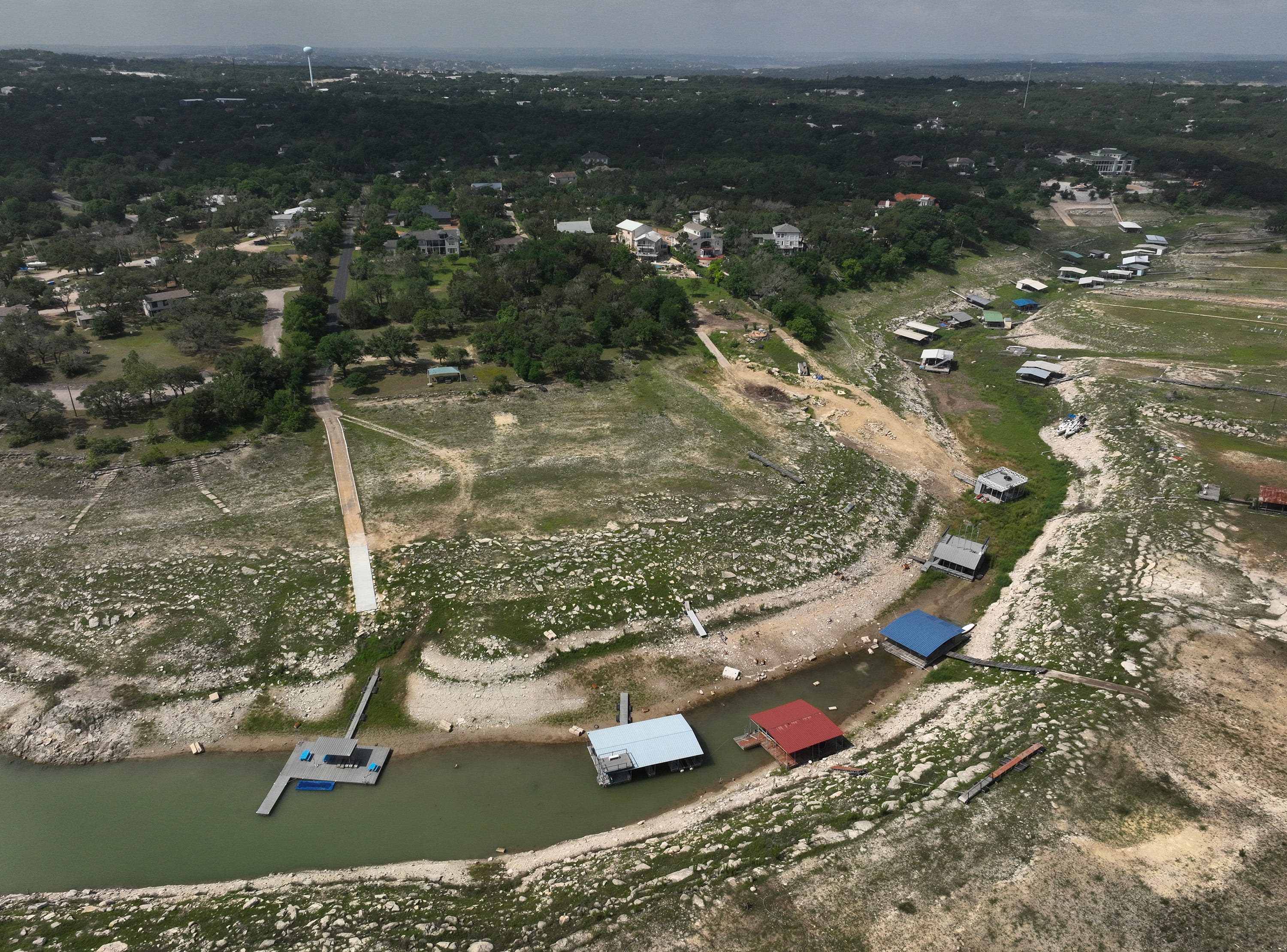 Floodgates open to distribute runoff water into Lake Travis from Lake LBJ, Llano River