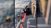 3 people, dog rescued from sinking vessel off of Clearwater's coast