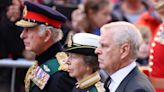 A heckler was arrested after calling Prince Andrew 'a sick old man' as he walked behind the Queen's coffin