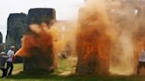 Protesters arrested after painting Stonehenge monument orange