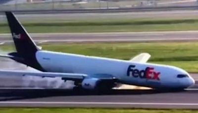 Horrifying moment Boeing plane smashes into runway after landing gear failed