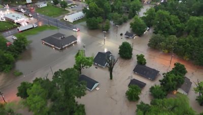 Drone video shows Texas town underwater as boats rescue residents trapped in homes