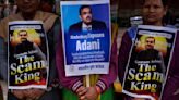 Adani woes spur protests as stock turmoil turns political