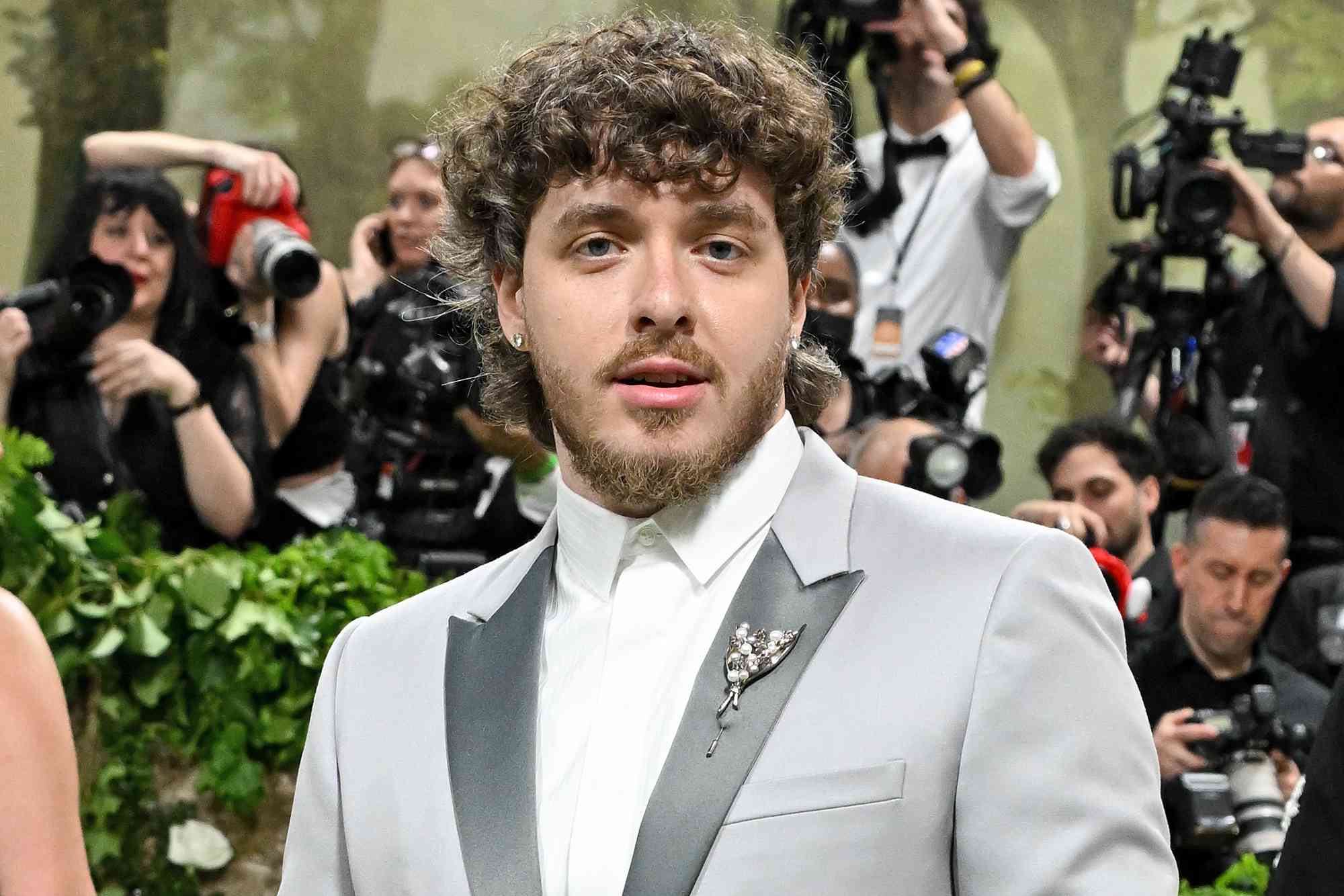 Jack Harlow Wears a Stylish Gray Suit to the 2024 Met Gala with a Subtle Nod to the Event's Dress Code