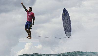 2024 Olympics: Brazilian surfer Gabriel Medina appears to defy gravity in spectacular photo from record-setting wave