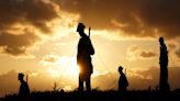 Silhouettes of 1,475 servicemen and two women who died on D-Day installed