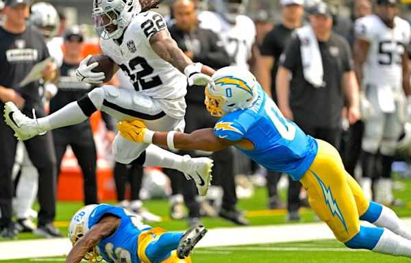 Raiders’ Alexander Mattison hurdles to a time share with Zamir White at running back