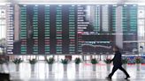 Asia stocks hit 27-month top, dollar slips on rate cut talk - CNBC TV18