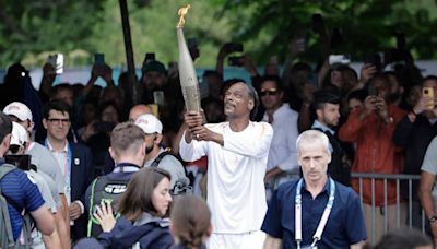 Paris Olympics: Snoop Dogg lights up torch run