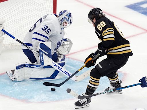 David Pastrnak scores in overtime to lift Bruins to Game 7 win over rival Maple Leafs