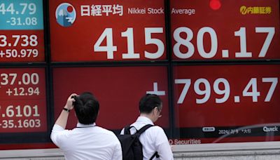 Stock market today: Global stocks mostly rise, with Japan's Nikkei 225 index logging record close